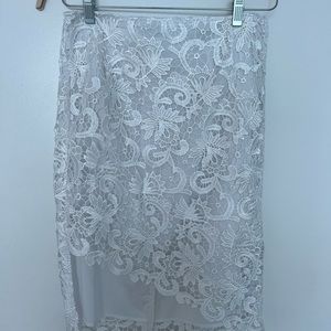 GUESS Los Angeles white patterned high low skirt. Never worn out. Size 10